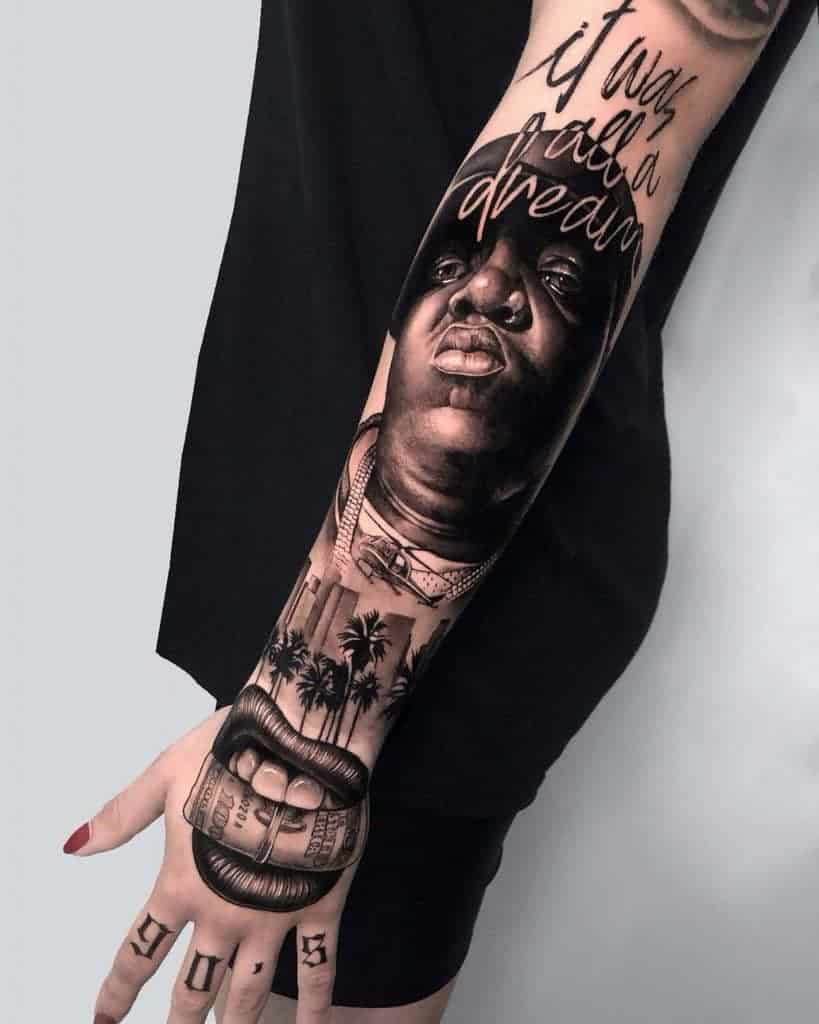 Detailed tattoo sleeve with portrait, writing, palm trees, and lips holding cash