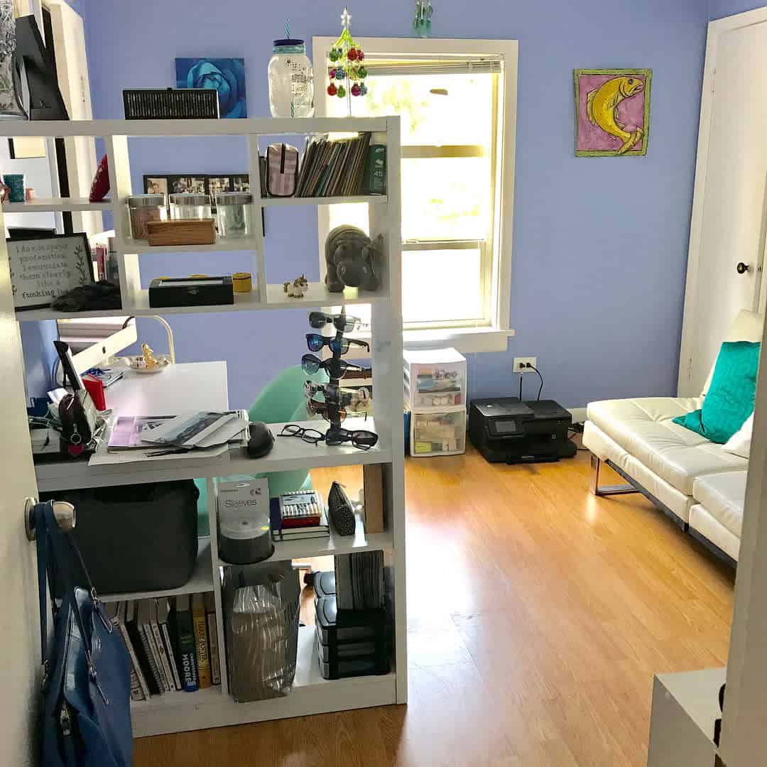 blue accent wall in small living room office