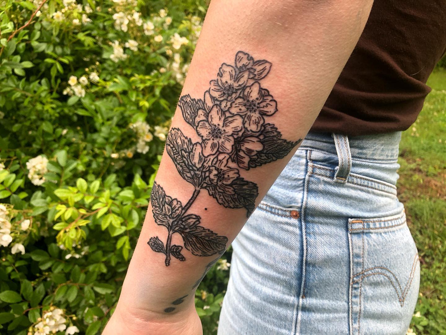Floral tattoo on a forearm