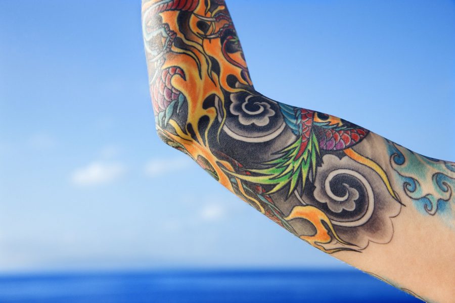 Bright Tattoo Sleeve with Blue Background