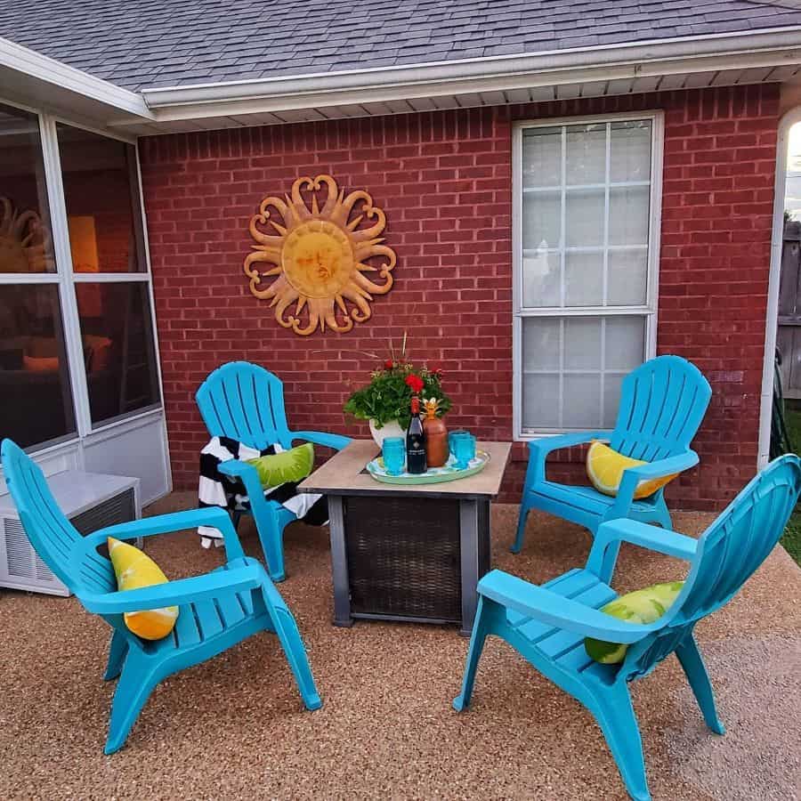 budget friendly patio with blue plastic seats