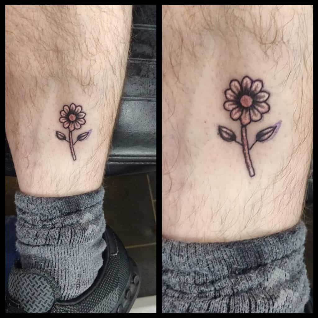 Calf tattoo small traditional color yellow daisy