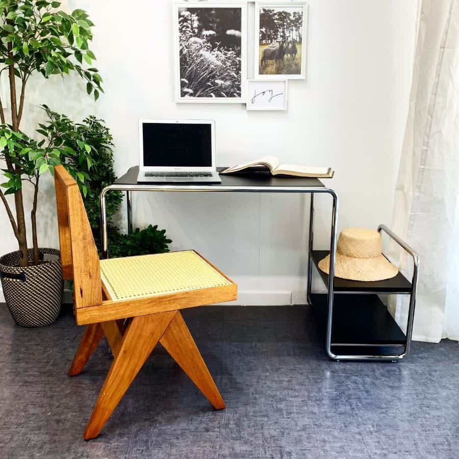small home office setup with vintage chair