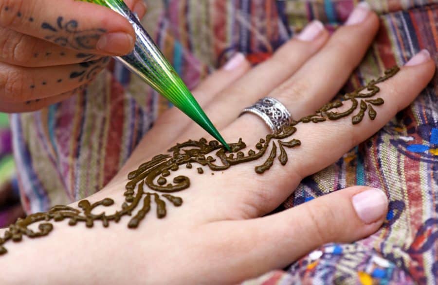 Close Up Henna Application Piping