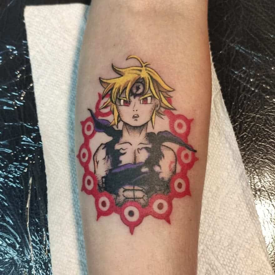 Colorful tattoo of Meliodas in his Assault Mode from The Seven Deadly Sins, featuring a third eye and surrounded by Dragon’s Sin of Wrath