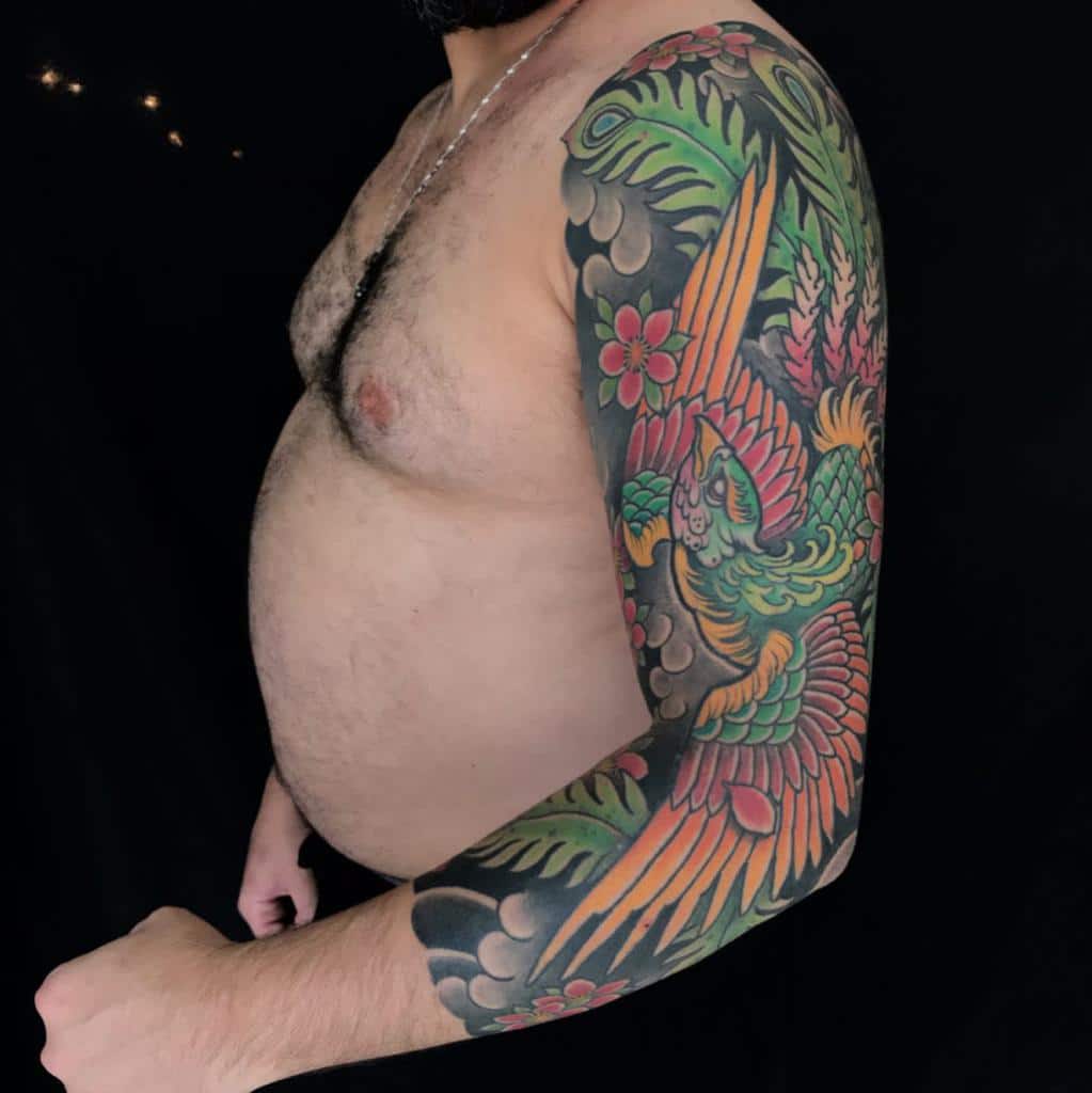 Colored 3 4 sleeve tattoo leolauro
