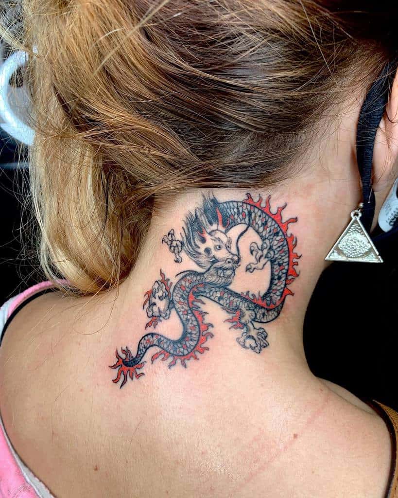 Tattoo of a black and red dragon on a woman's neck, with detailed scales and fierce expression