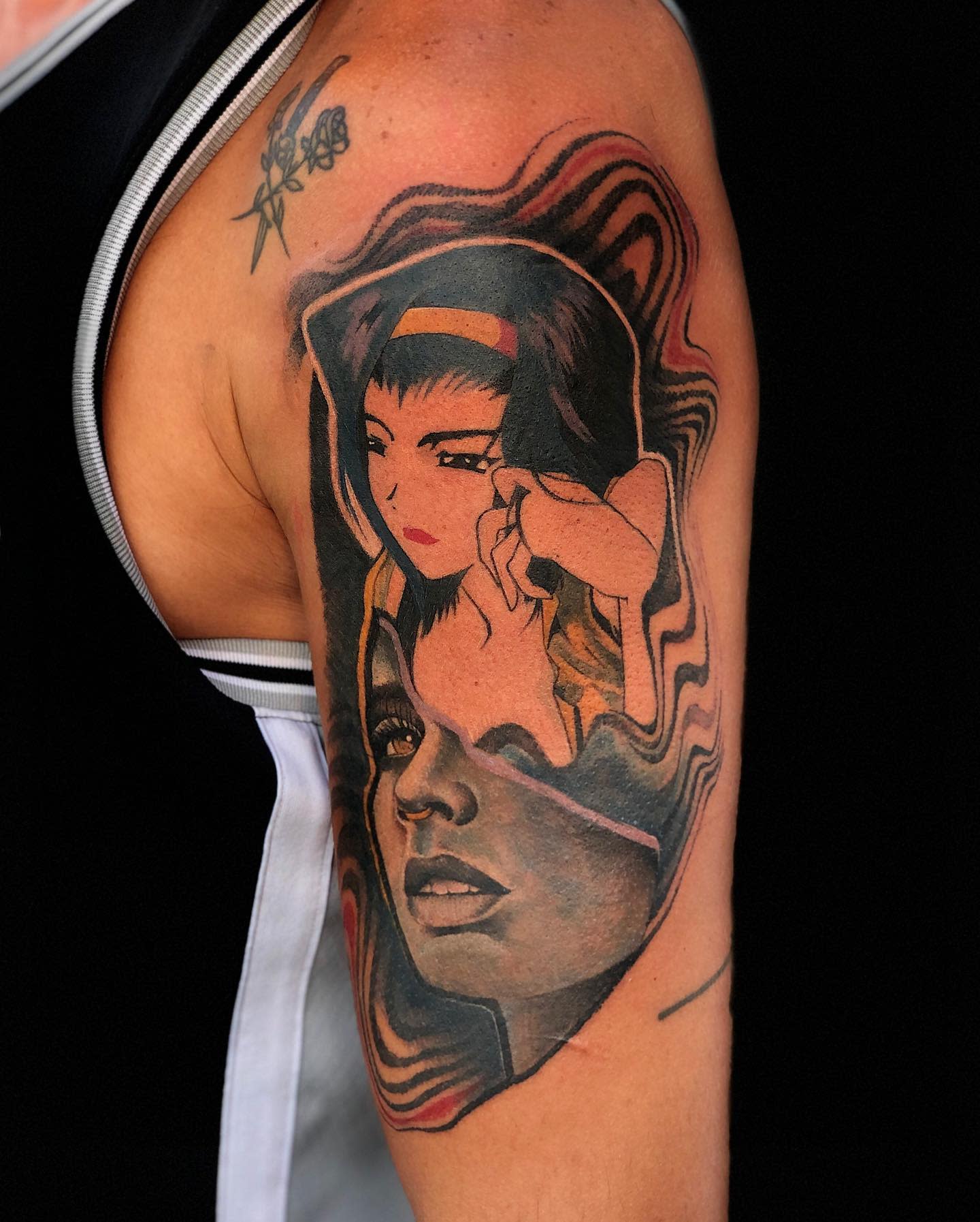 Tattoo of Faye Valentine from Cowboy Bebop, with a contemplative expression, in a stylized frame