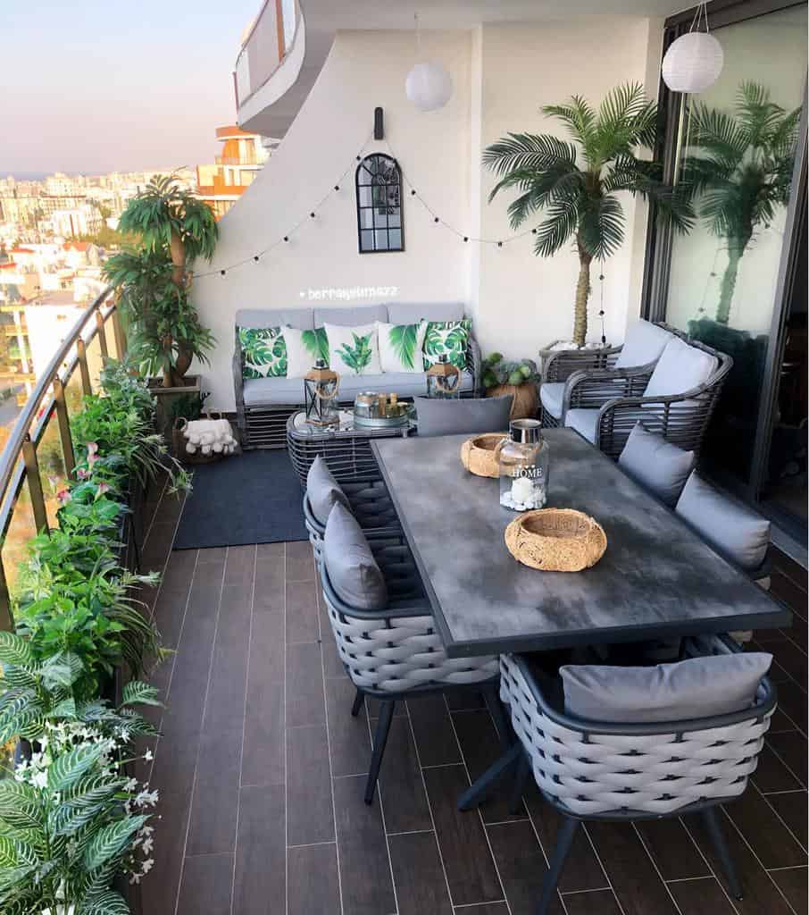 mediterranean style apartment deck outdoor furniture plants city view