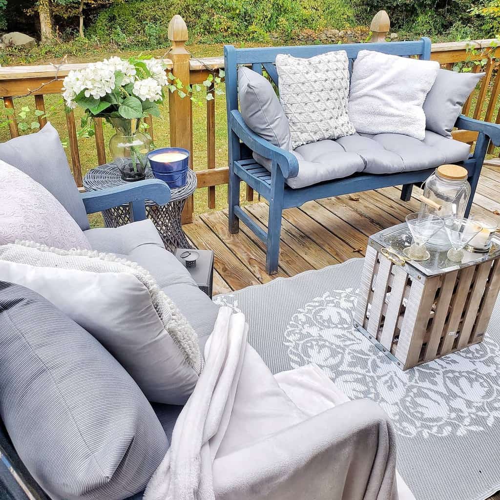 cozy wood deck blue and gray wood furniture