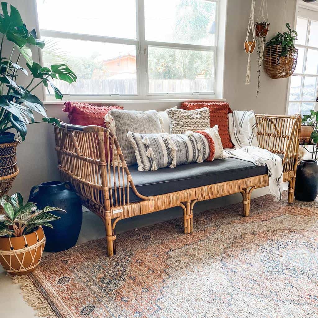 bamboo furniture in sunroom with hanging plants