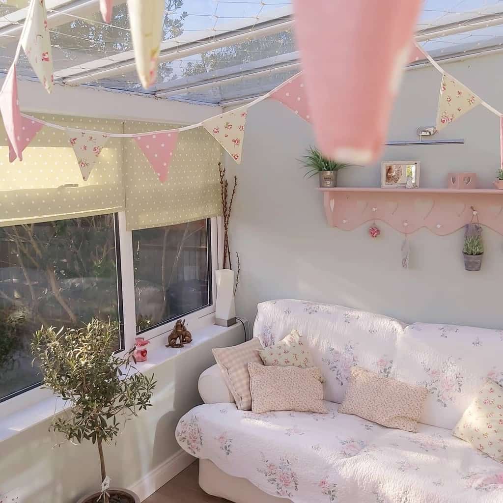 small sunroom with floral patterns on sofa