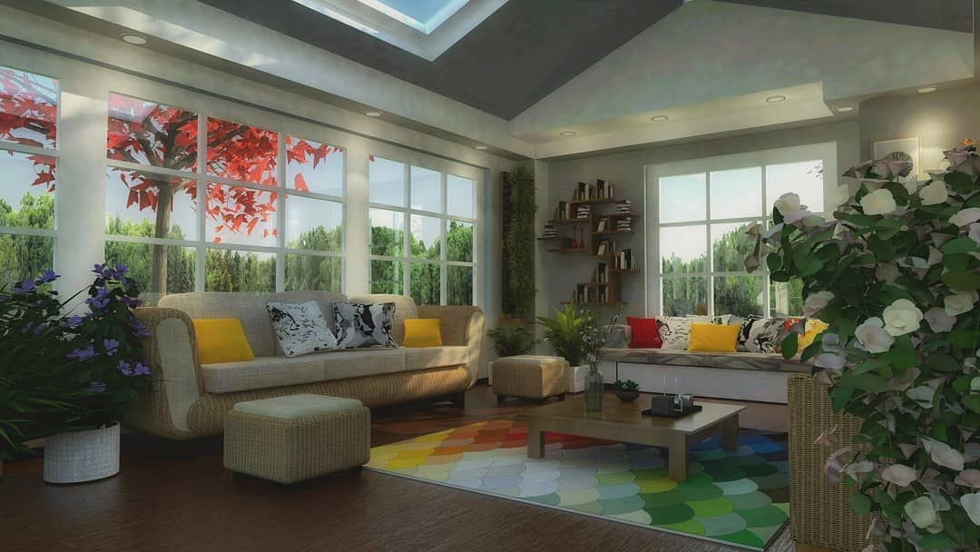 large sunroom with sofa and plants