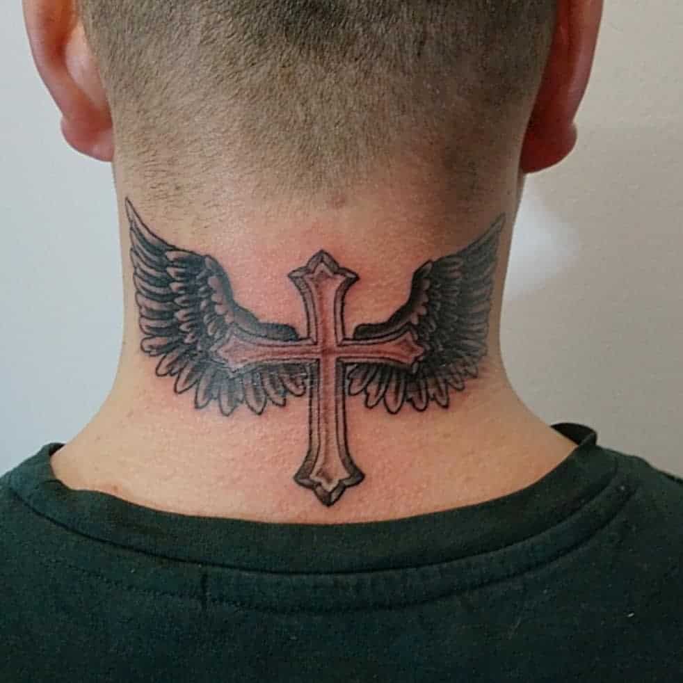 Back of neck tattoo, cross with wings in black and gray shading