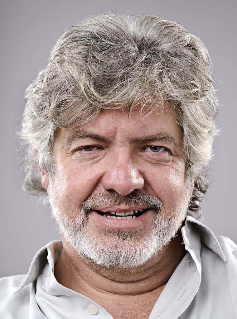 Curly Medium Hairstyle For Older Guys