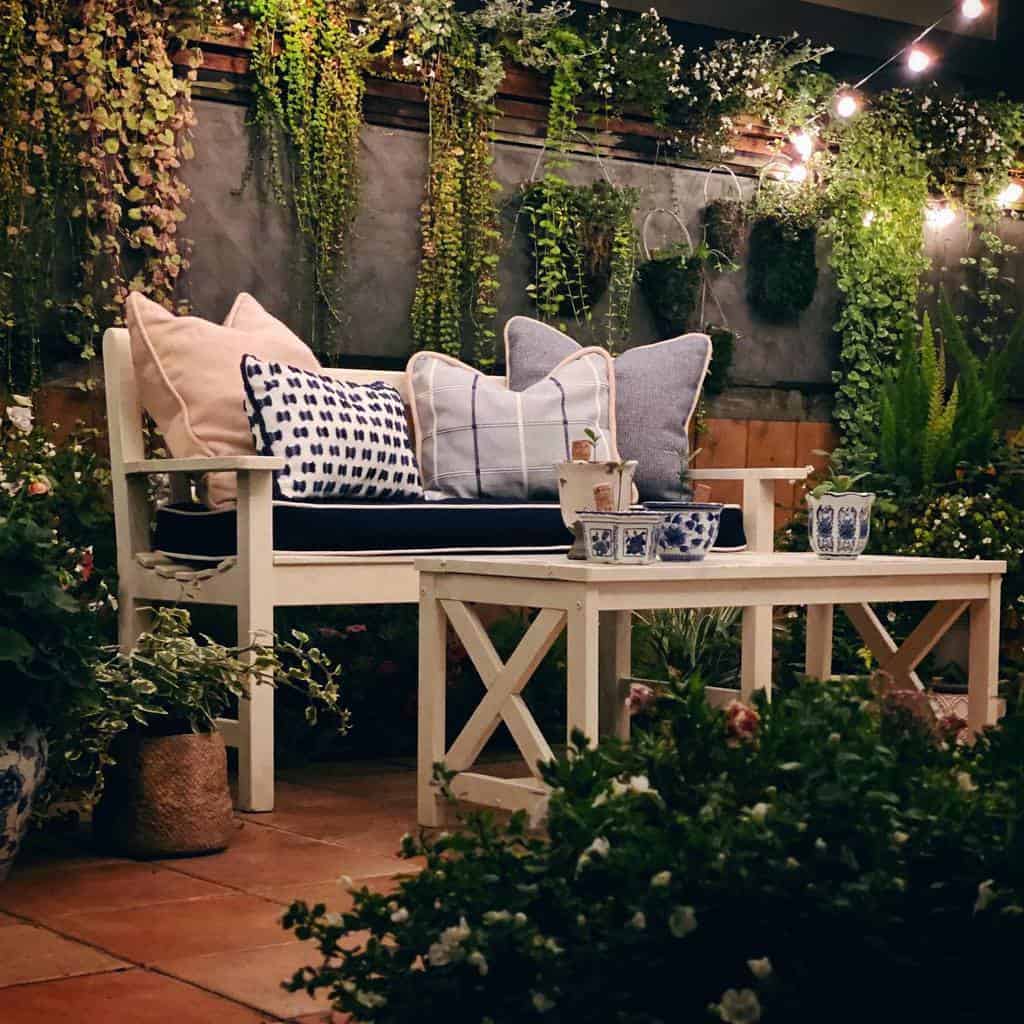charming patio garden with hanging plants 