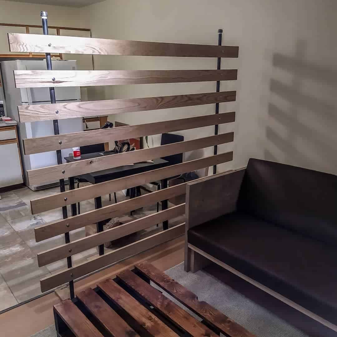 wood plank wall divider brown sofa