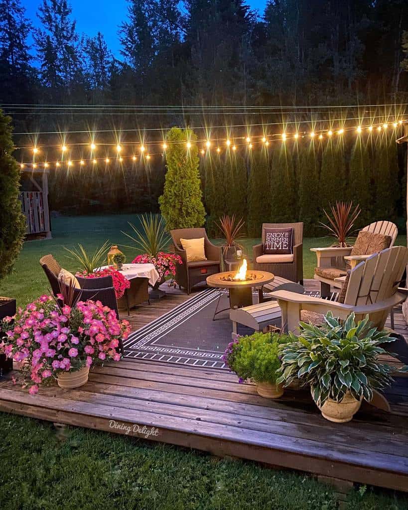 large deck patio garden with string lights 