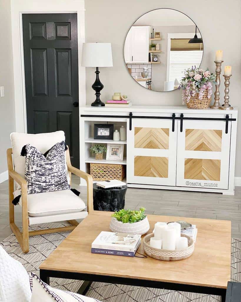 small country living room white cabinet circular wall mirror