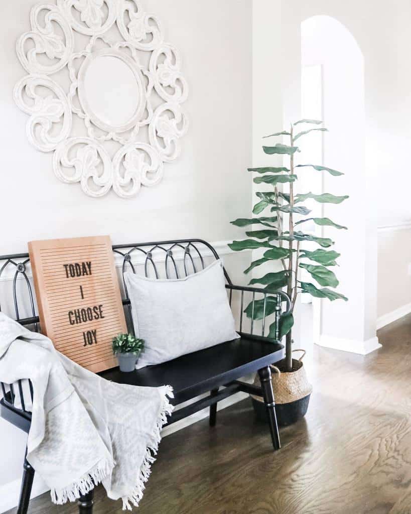 white hallway with black seat