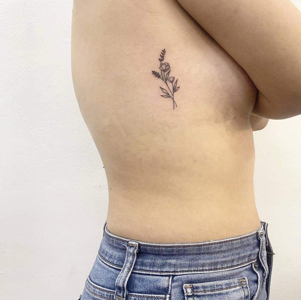 Delicate Flower Rib Tattoos motus.ink