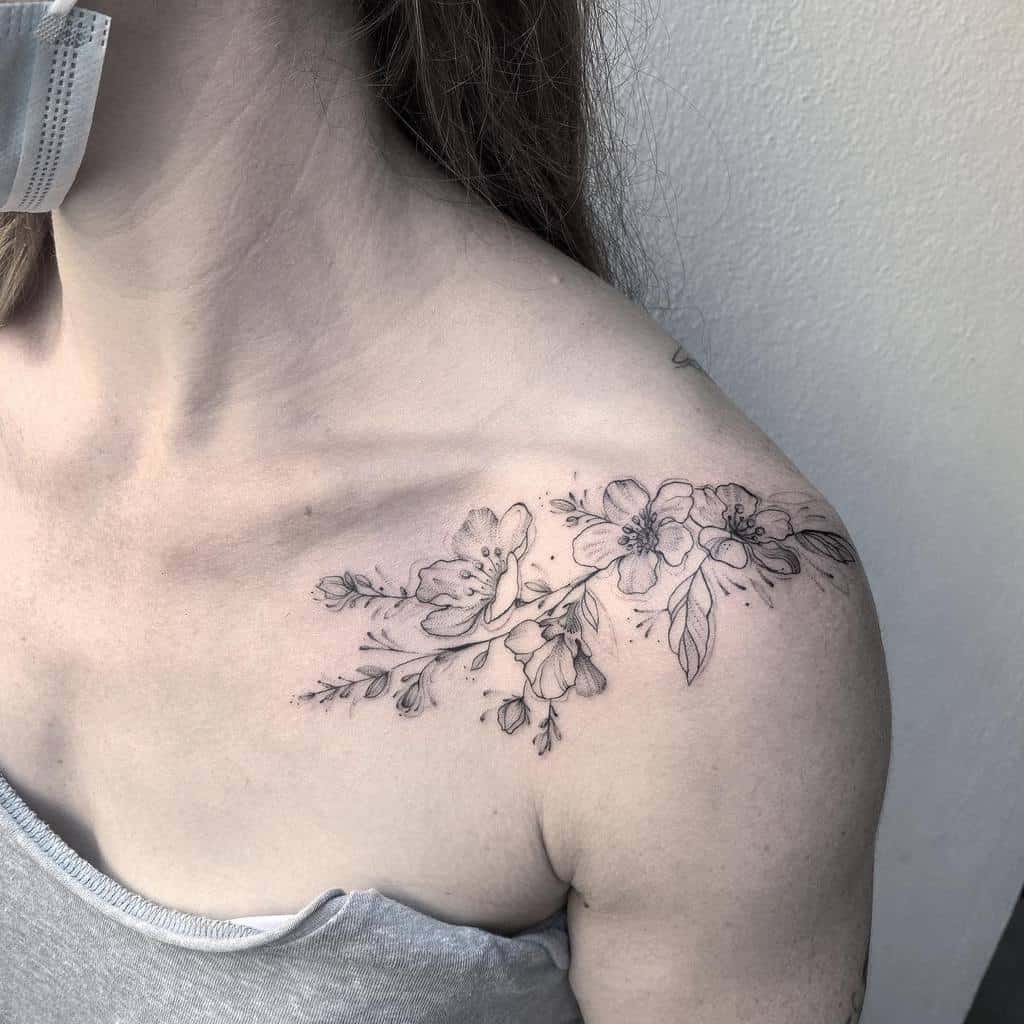 Delicate Flower Shoulder Tattoos sionagrether