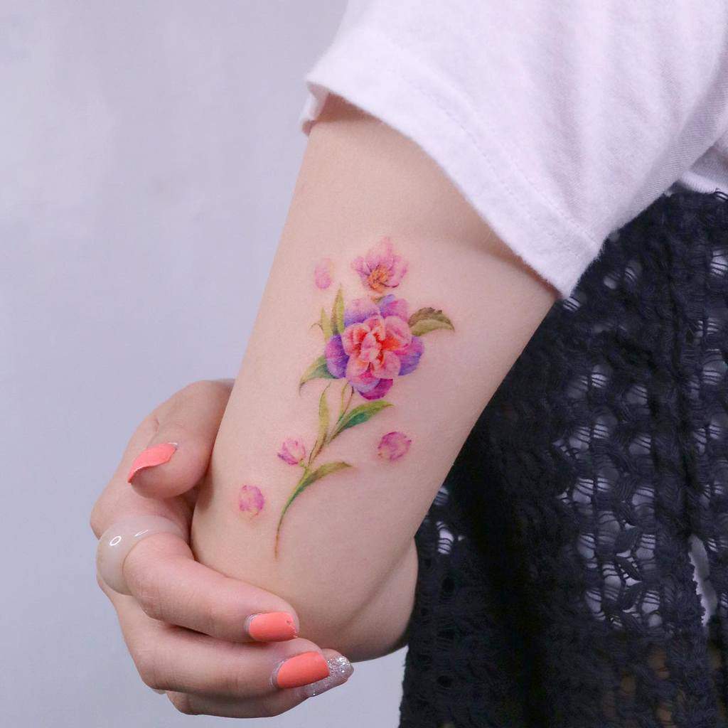 Delicate Flower Upperarm Tattoos 2 tilda_tattoo