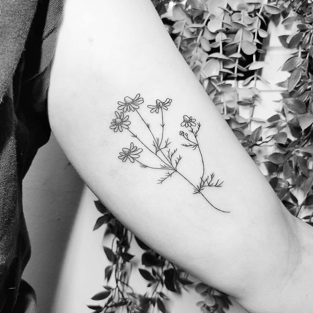 Delicate Flower Upperarm Tattoos tattoosbyina