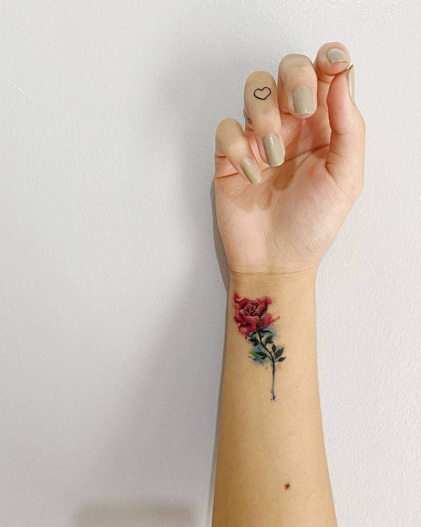 Delicate Flower Wrist Tattoos kriziaolpindo
