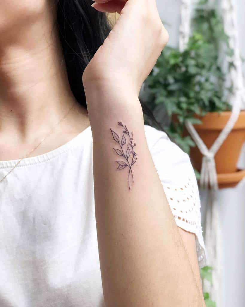 Delicate Flower Wrist Tattoos thelittleloft