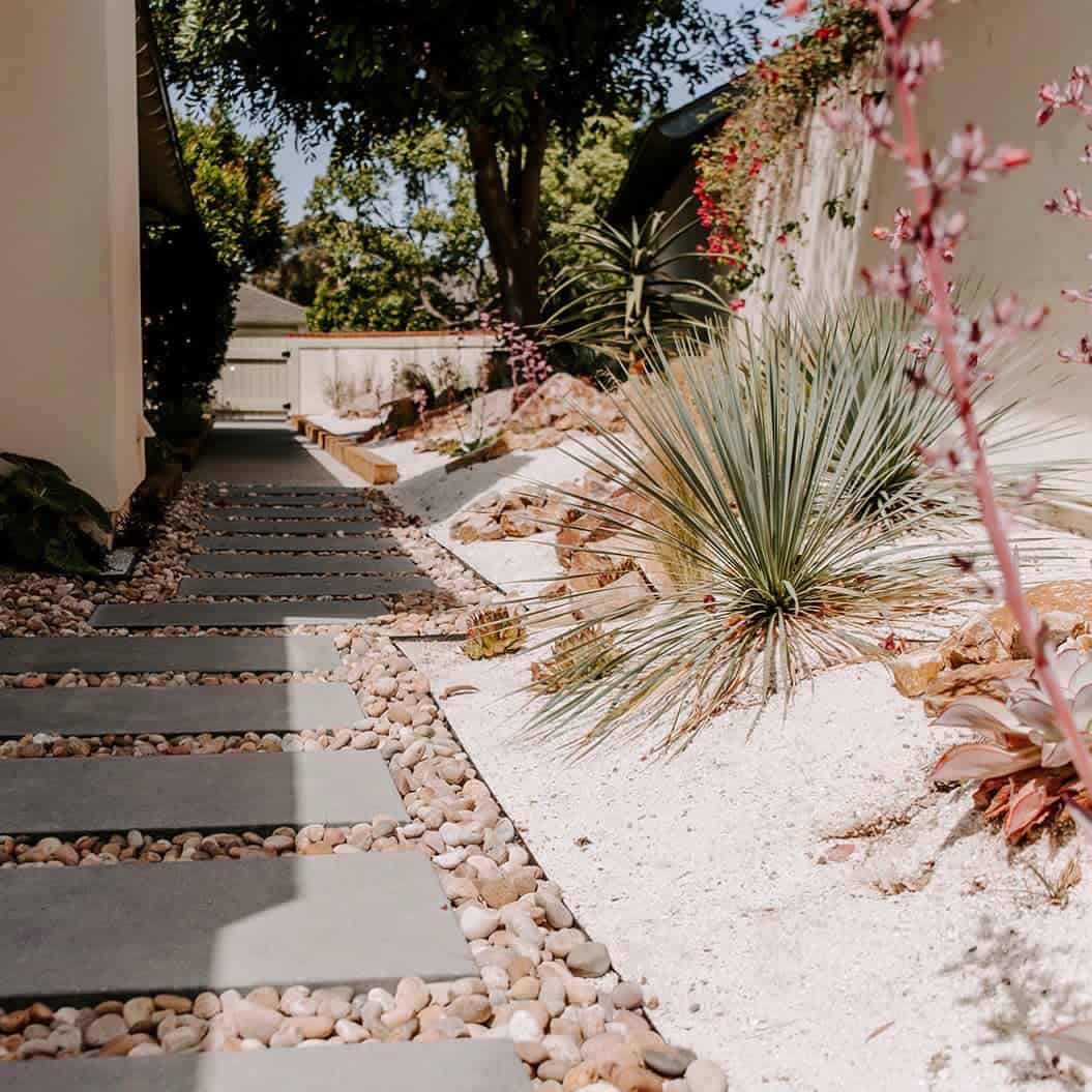 desert backyard stone paver path desert plants 