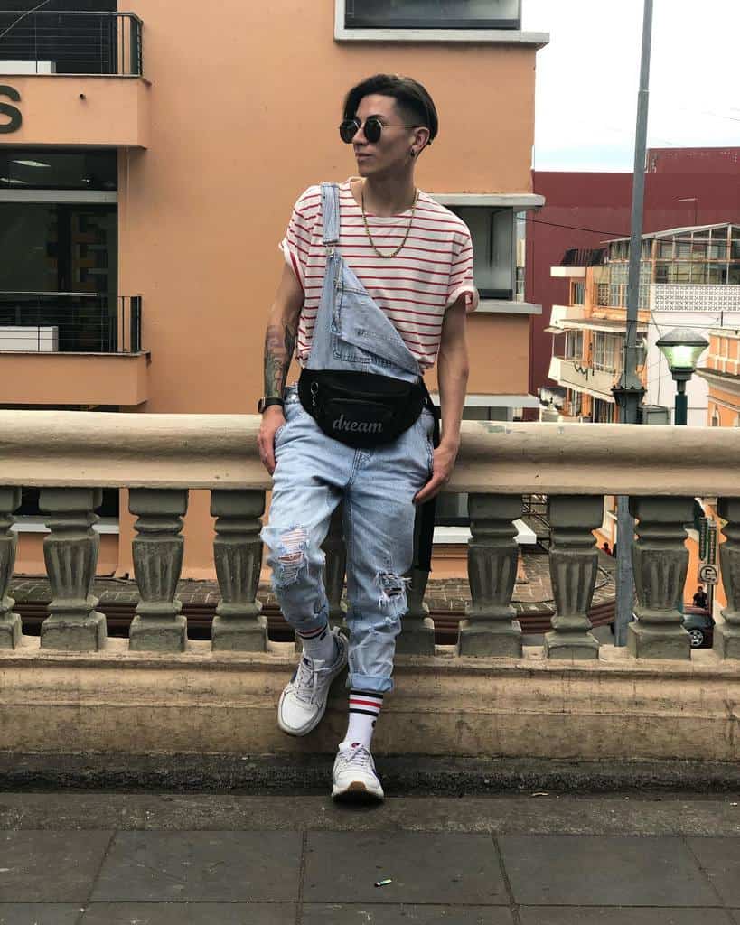 Man Wearing Distressed Denim Jeans