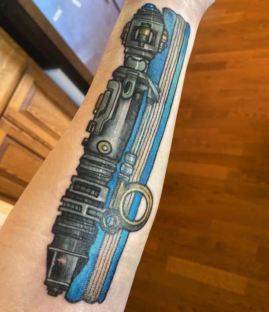 Detailed tattoo of the Sonic Screwdriver from Doctor Who, with a realistic metallic finish and blue highlights