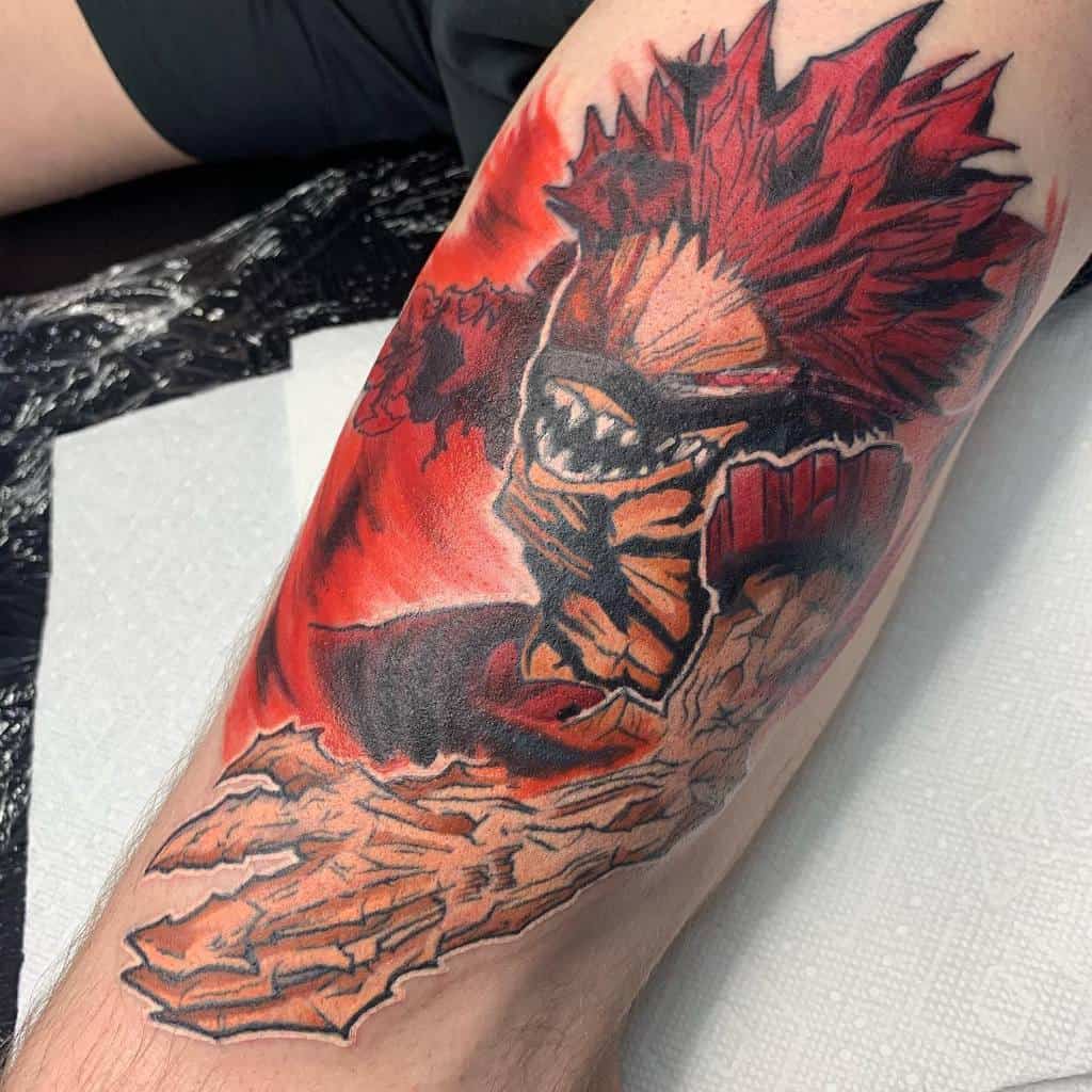 Bold tattoo of Eijiro Kirishima from My Hero Academia in his hardened form, with intense red tones, fierce expression, and cracked ground