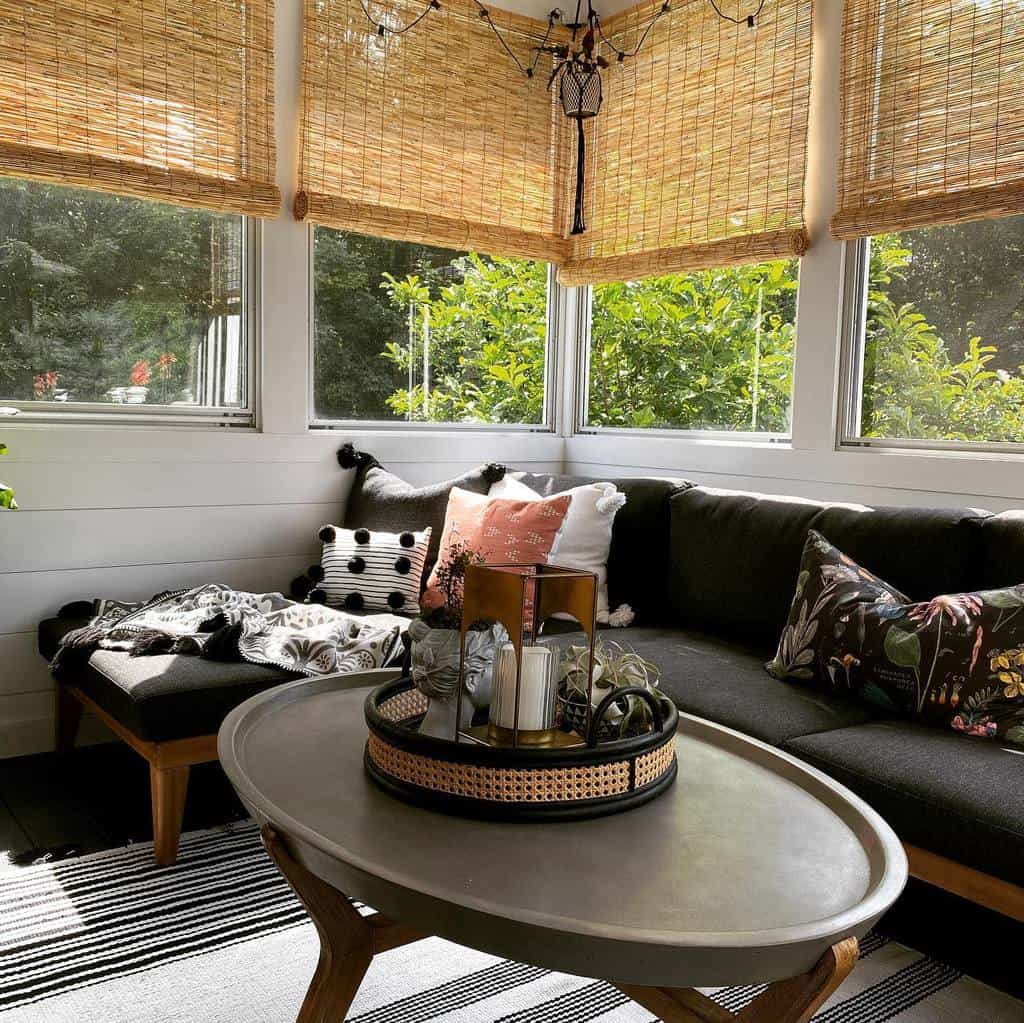 elegant sunroom with black sofa