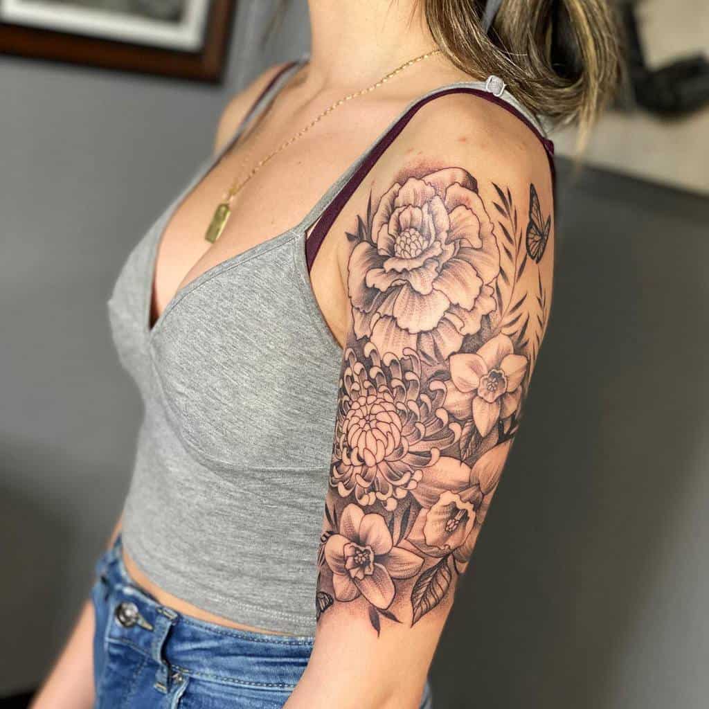 Woman with a floral peony tattoo sleeve