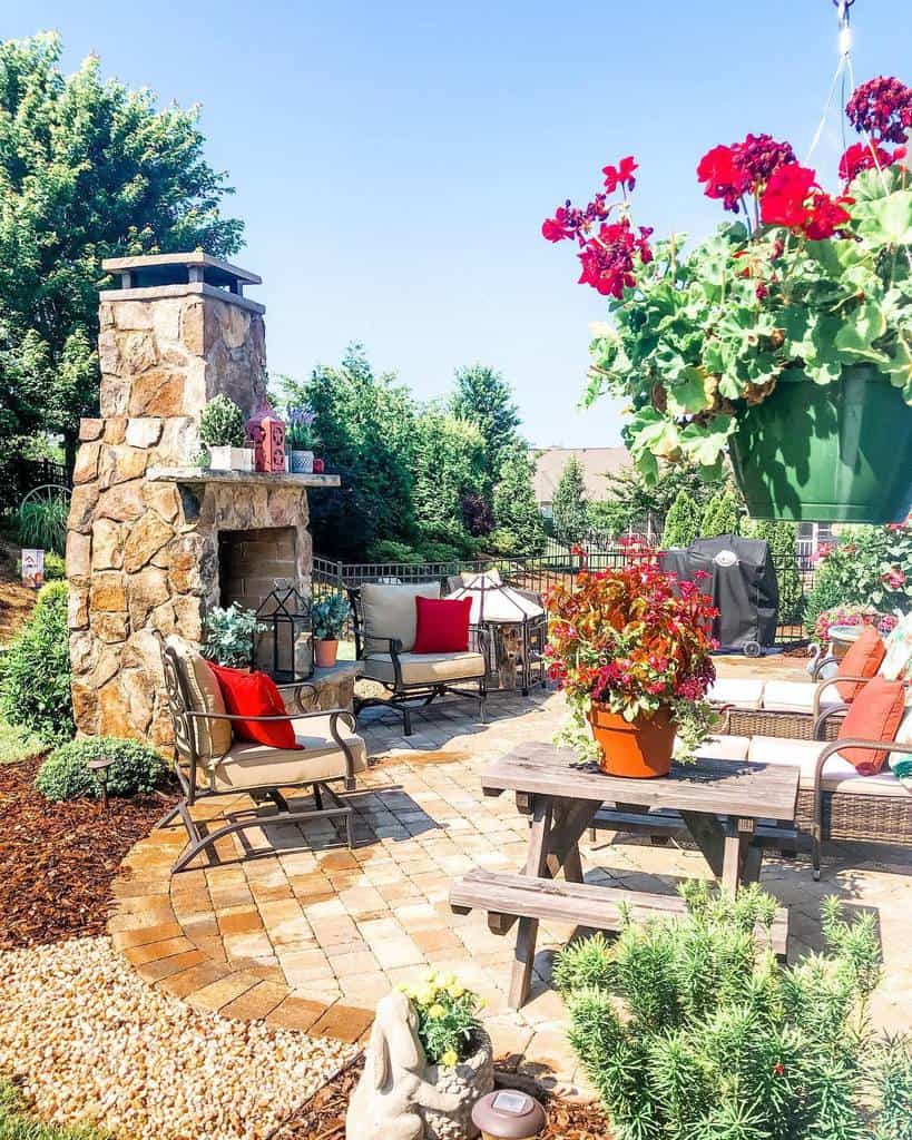 paver patio garden with stone fireplace 