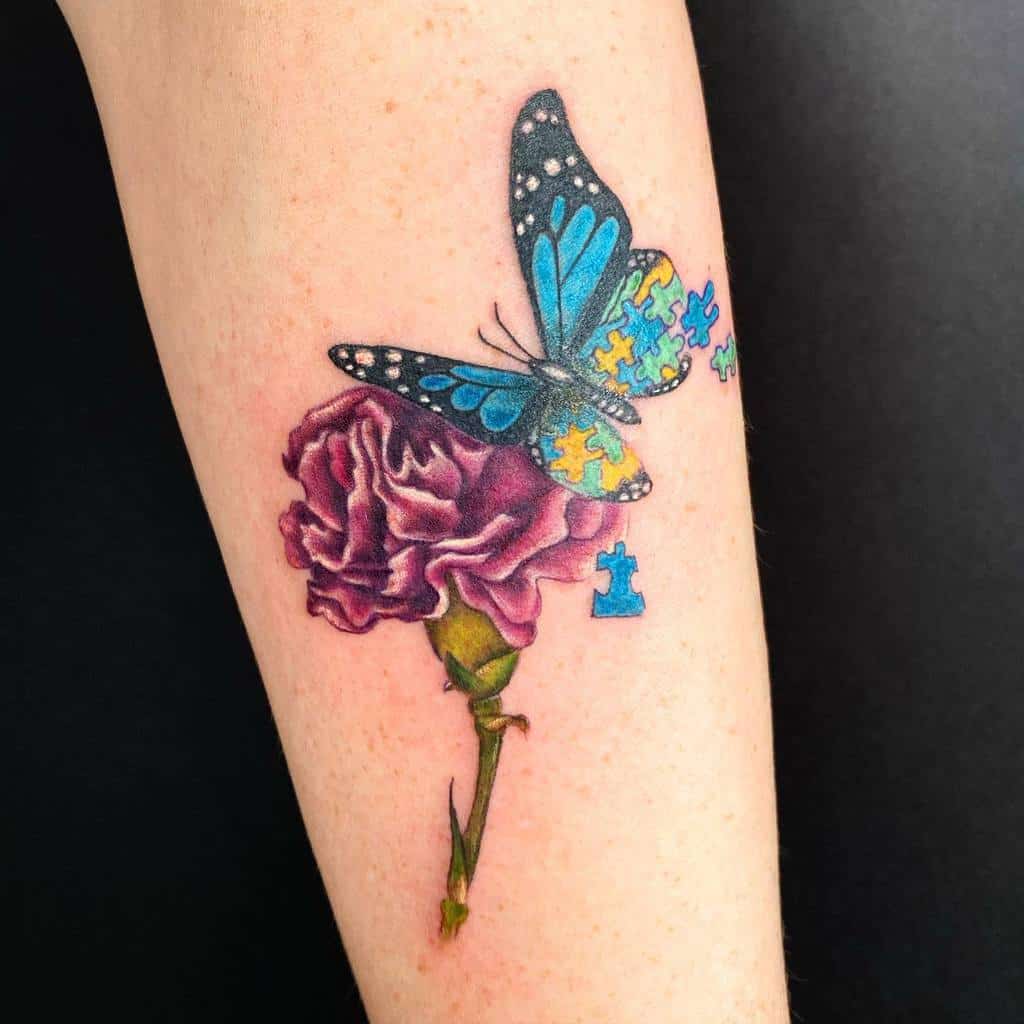 Tattoo of a blue butterfly with puzzle pieces and a rose on a forearm