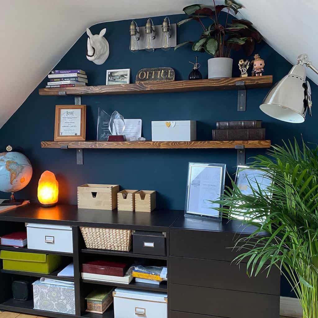 blue feature wall with wood shelving attic office