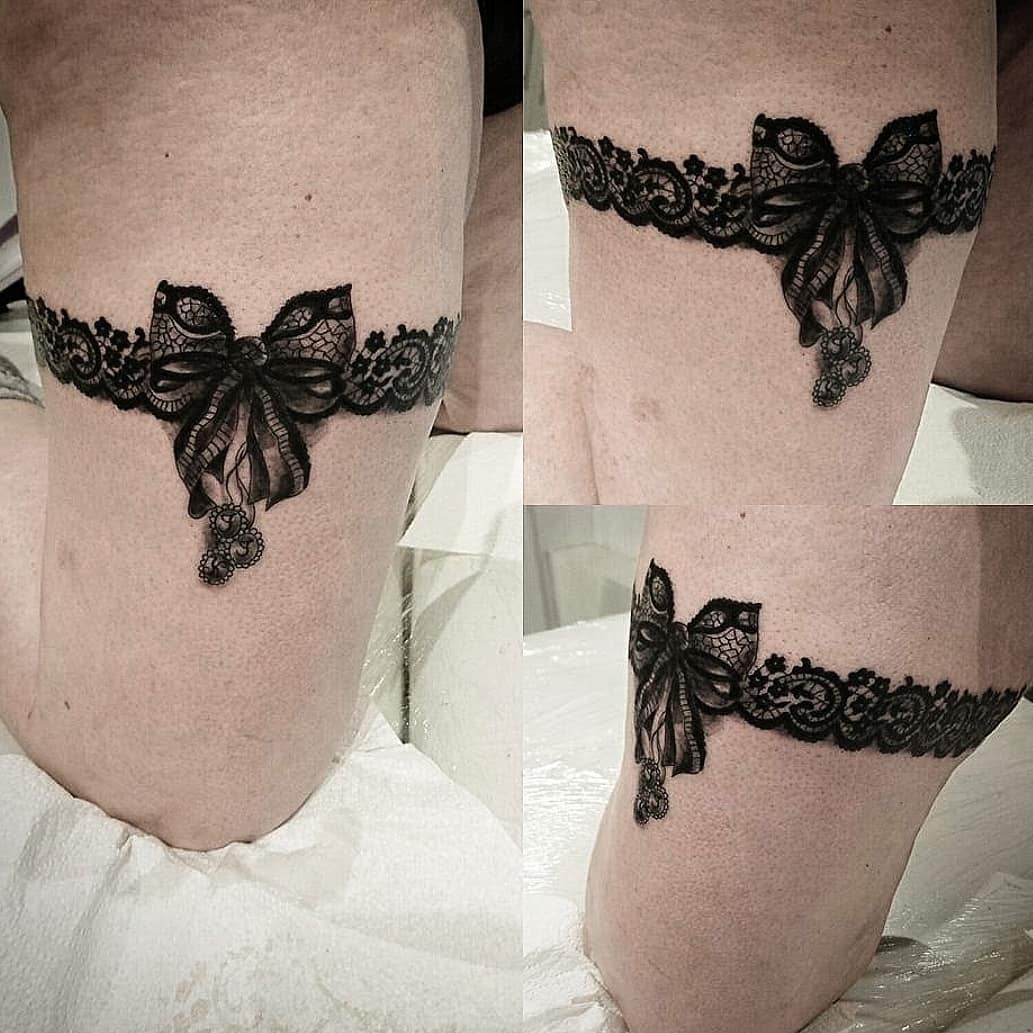 Black lace garter tattoo with intricate bow design on the thigh shown from different angles