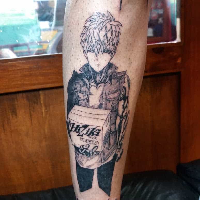 A black ink tattoo of Genos from One Punch Man holding a box labeled "Hi-LitZ," featuring fine linework and manga-style shading