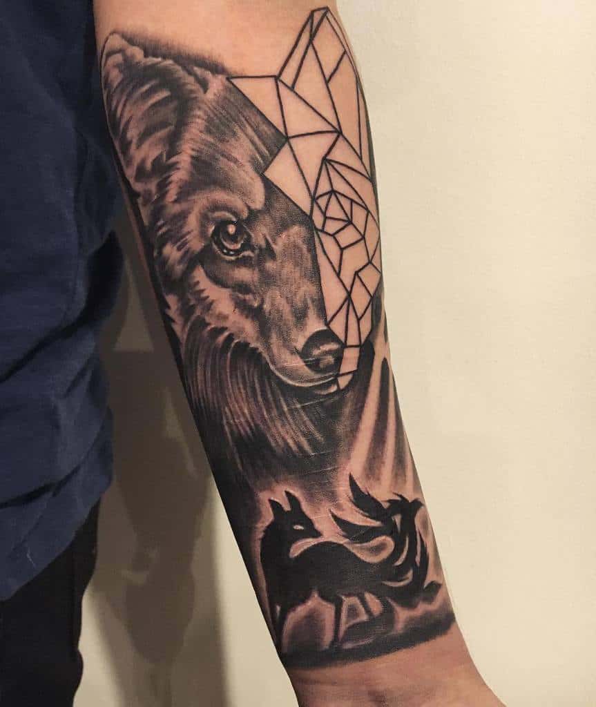 Forearm tattoo of a fox with geometric shapes and fox silhouette below