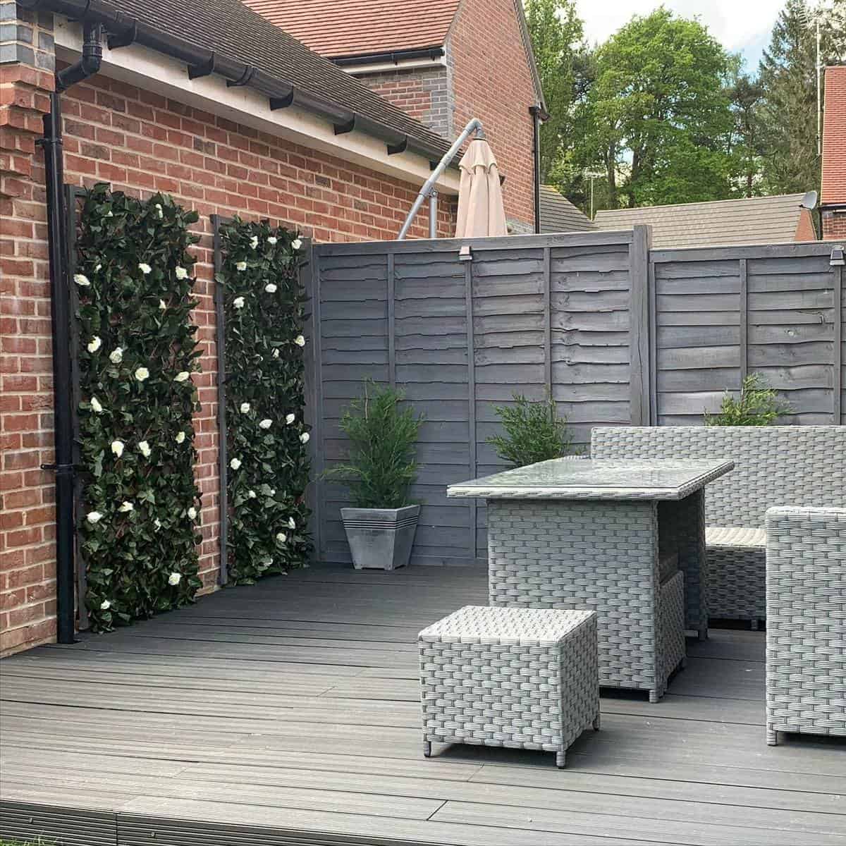gray deck gray outdoor furniture vertical planter