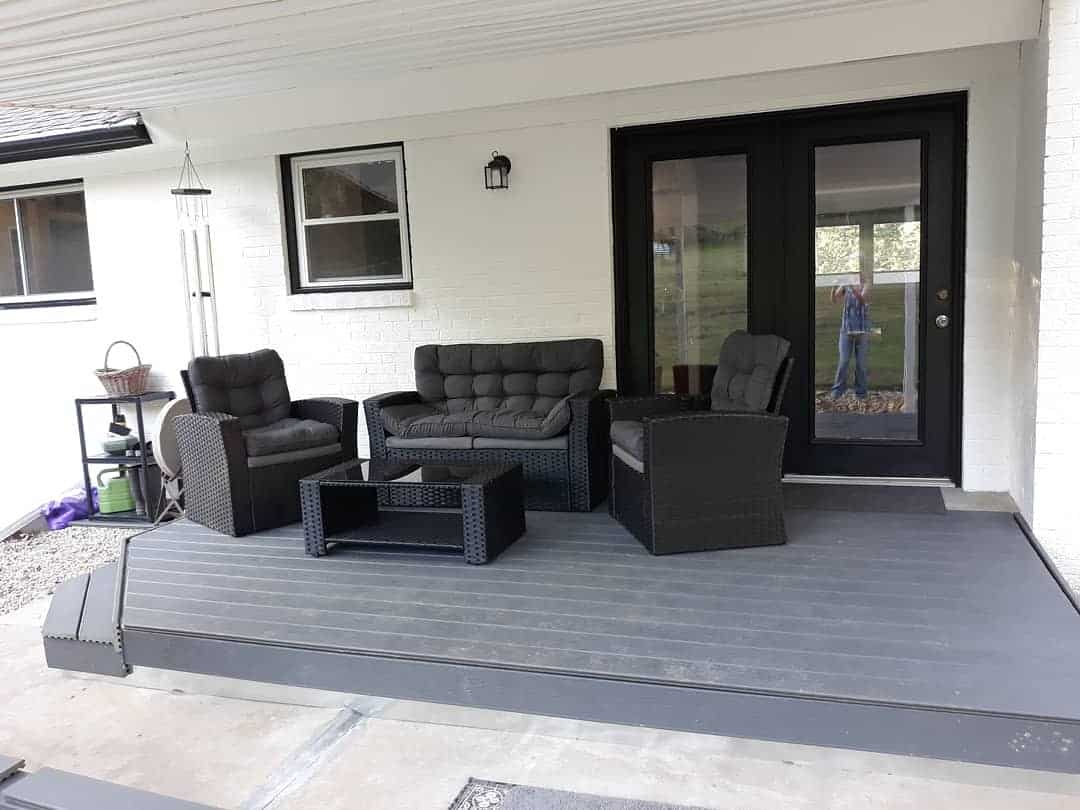 small gray deck black wicker furniture