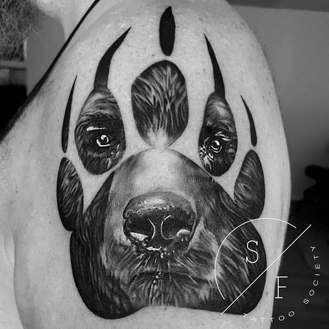 Black and gray bear face with bear paw print on shoulder