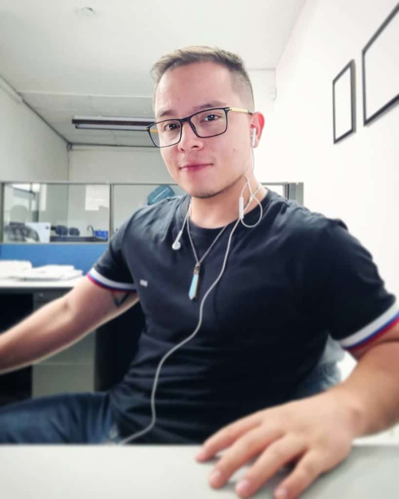 Guy In T-Shirt Wearing Glasses