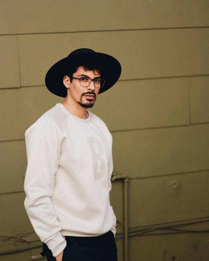 Guy In Hat Wearing Glasses