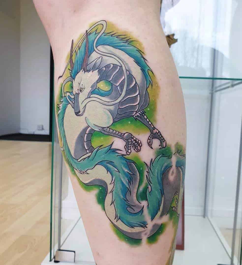 Haku tattoo from Studio Ghibli's Spirited Away, featuring the dragon with vibrant green accents