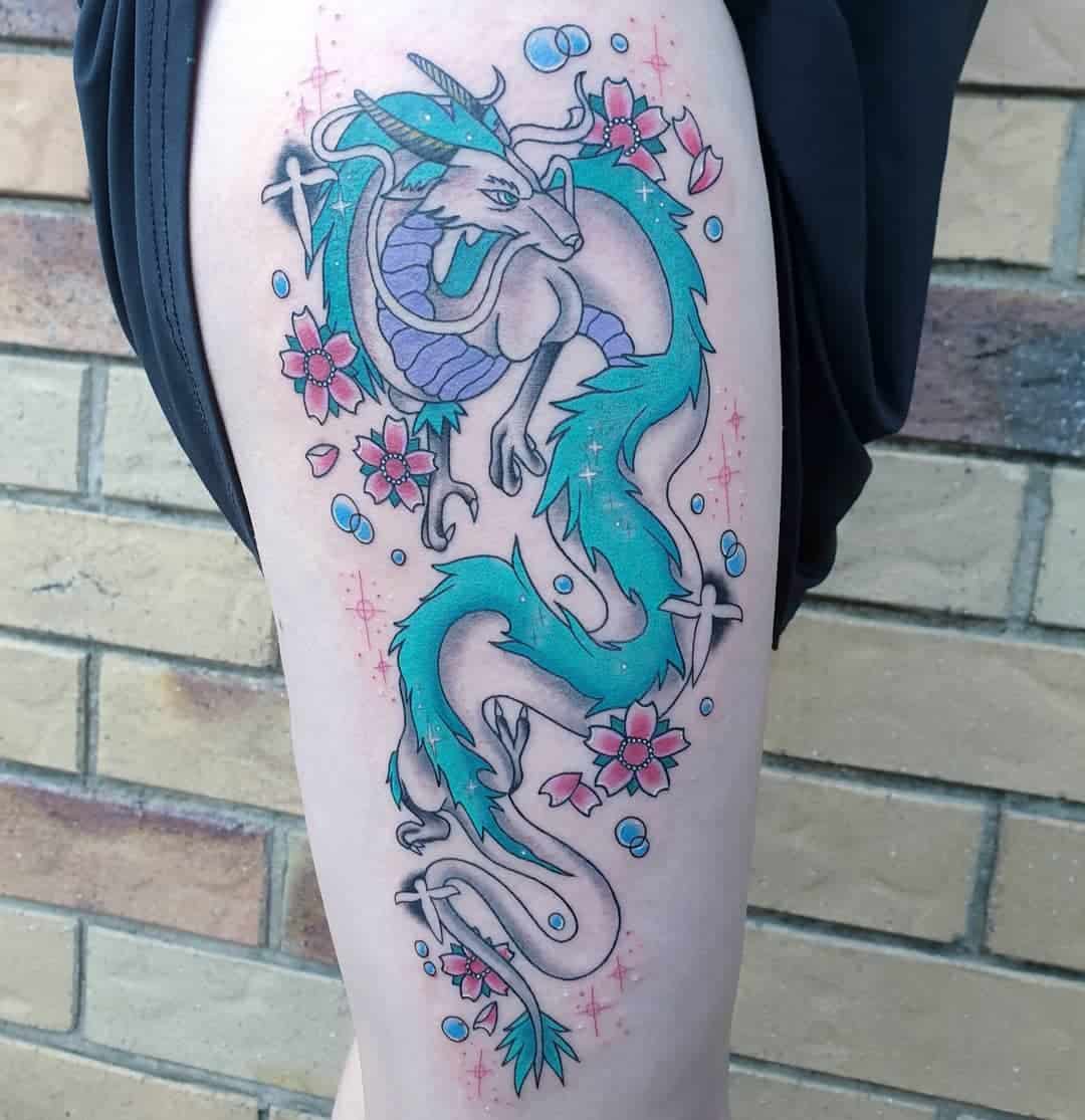 Haku tattoo from Studio Ghibli's Spirited Away, showing the dragon with cherry blossoms