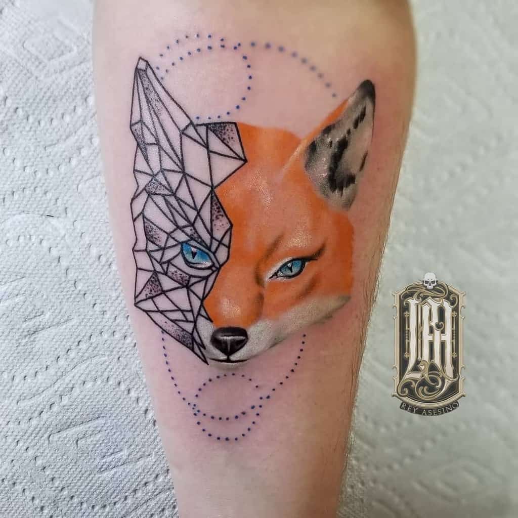 Tattoo of a fox with one side geometric and the other side realistic on upper arm